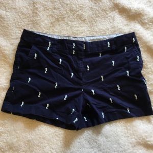 Navy shorts with seahorse detailing